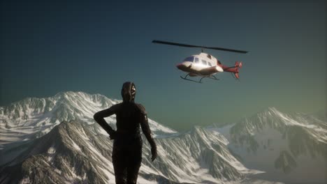 woman and helicopter in winter mountains