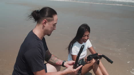 Couple-taking-goggles-out-from-backpack