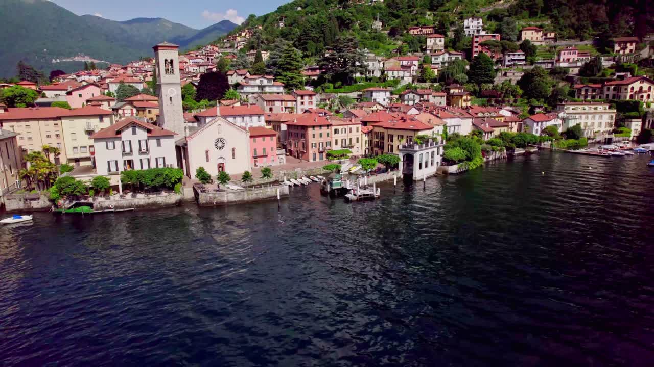 el colorido pueblo de torno, en el lago como revelación aérea, italia