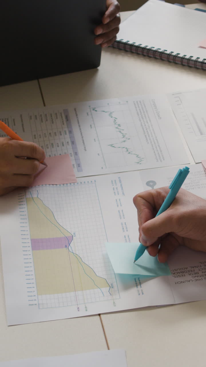 Business Team Analyzing Data and Project Plans