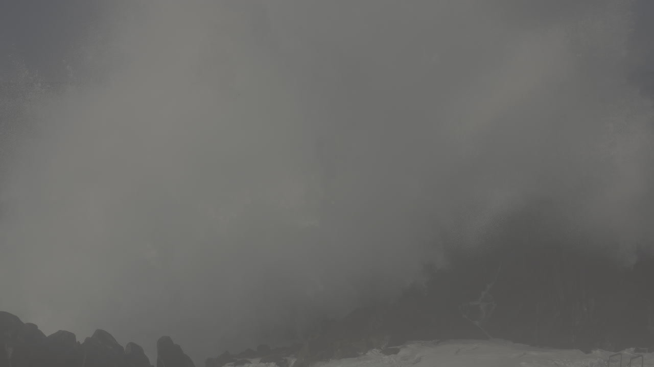Powerful Waves Crashing on Rocky Coastline