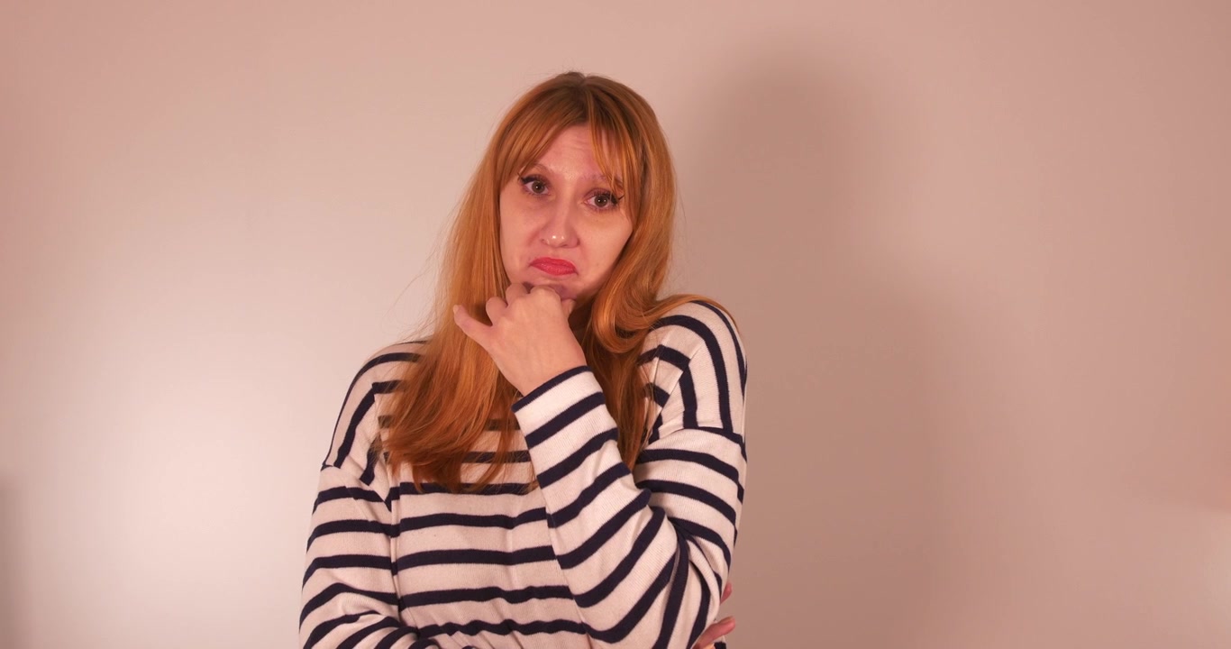 Beautiful girl dramatizing not knowing in different ways, medium closeup
