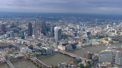 aerial shot of the financial district in downtown london with the shard coming into shot