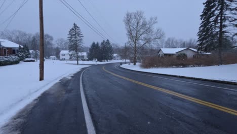 slow motion video of a snowy nor’easter in the suburbs of new york city, on a winter's day