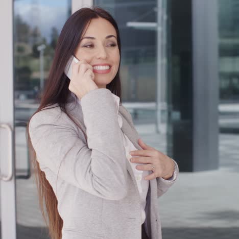Woman-with-big-smile-on-phone