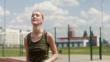 close-up view of blonde woman hitting a volleyball