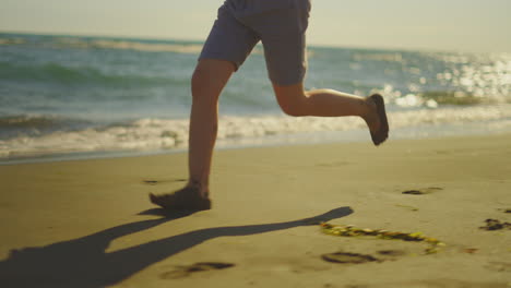 child running on the beach
