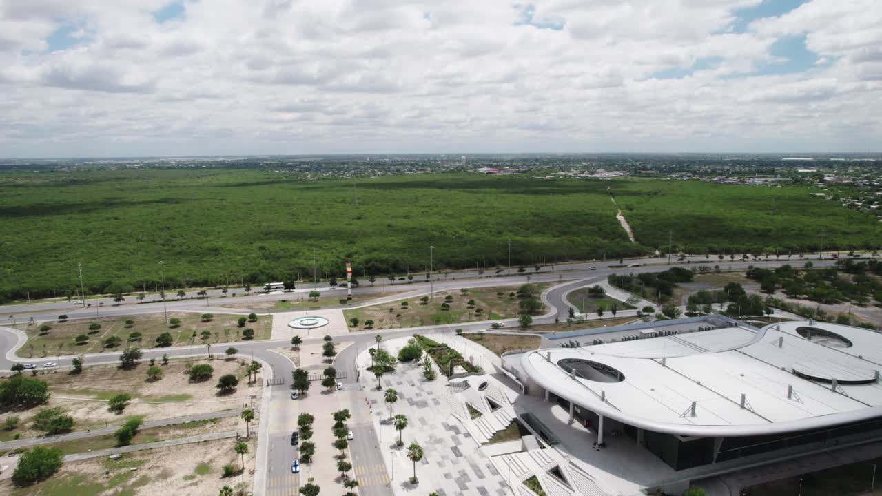 Aerial View of Modern Expo Tam Convention Center and Green Landscape