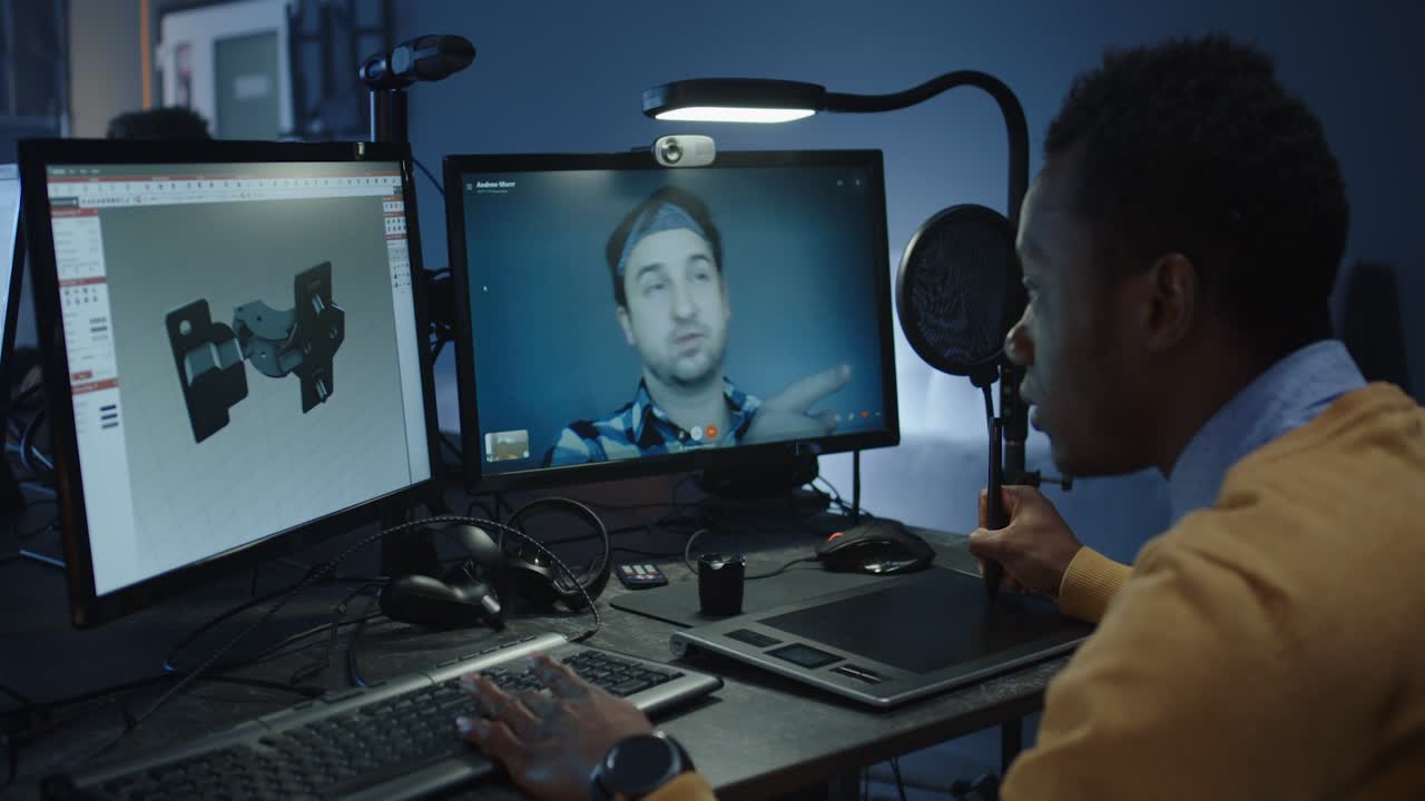 Designer Working on 3D Model and Video Conferencing