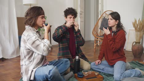 Friends enjoying a tea ceremony at home