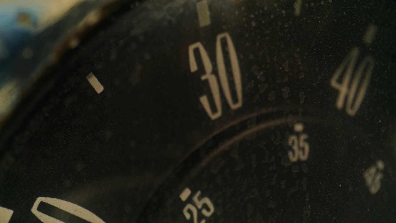 Close-up of a vintage car speedometer