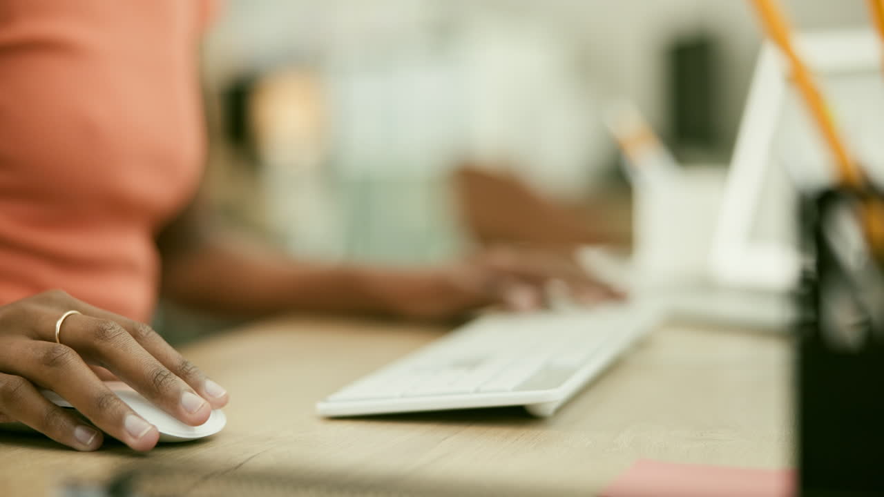 Person Typing on a Computer Keyboard