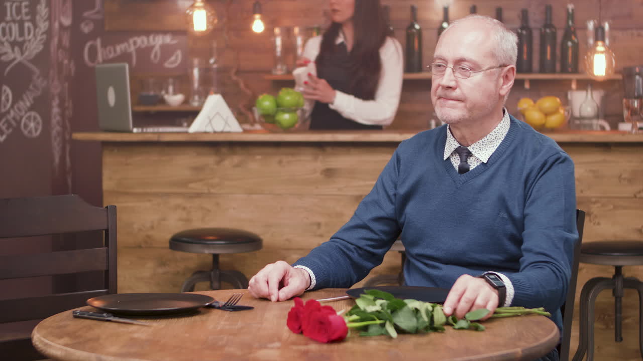 Man Waiting for a Date at a Restaurant