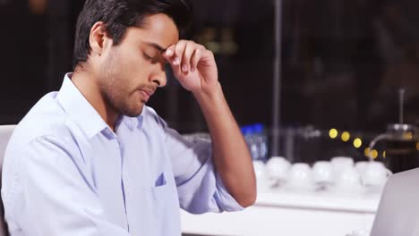 Businessman-working-on-laptop