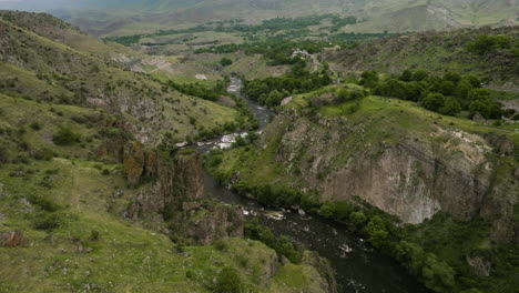 scenic view of kura river flowing in the mountains near tmogvi fortress archaeological site in georgia