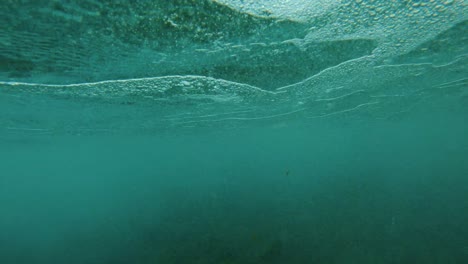 waves crashing under water