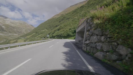 driving from the grimsel to the furka pass through the famous valley in the swiss alps