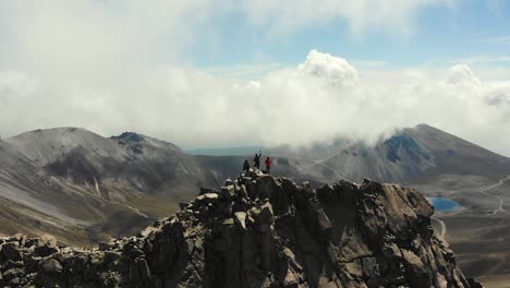 nevado de toluca: hikers overlooking the crater lake of mexico's volcano