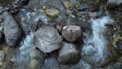 water is flowing through a mountain torrential river.
