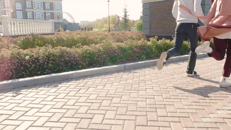 couple running in a city park