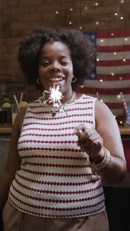 woman celebrating with sparkles