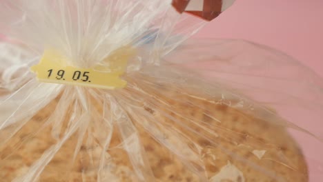 packaged bread with a date clip