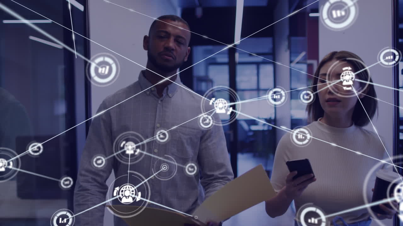 Animation of network of connections over two diverse business people using smartphone