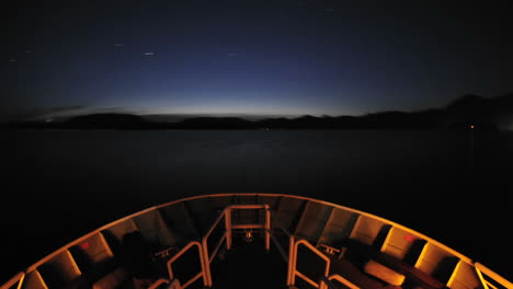 point of view time lapse of a ship leaving sitka at night and cruising up olga strait in southeast alaska