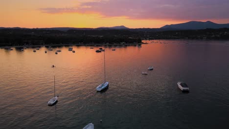 Magical-sunset-twilight-sky-above-Salo-city-and-lake-Garda,-Italy