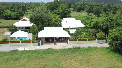 House-in-rural-Thailand-between-farmland