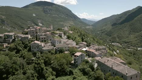 Drone-footage-over-"Pierosara"-a-little-town-at-the-beautiful-"Gola-della-Rossa"---Frasassi-Caves-Marche---Italy