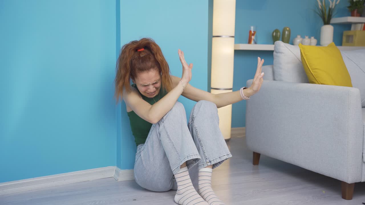 Paranoid guy pretending someone's coming.