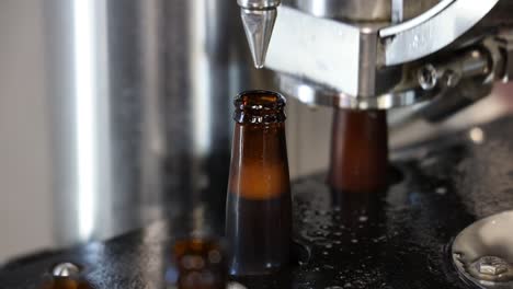 the distillery machine bottling beer in a storage