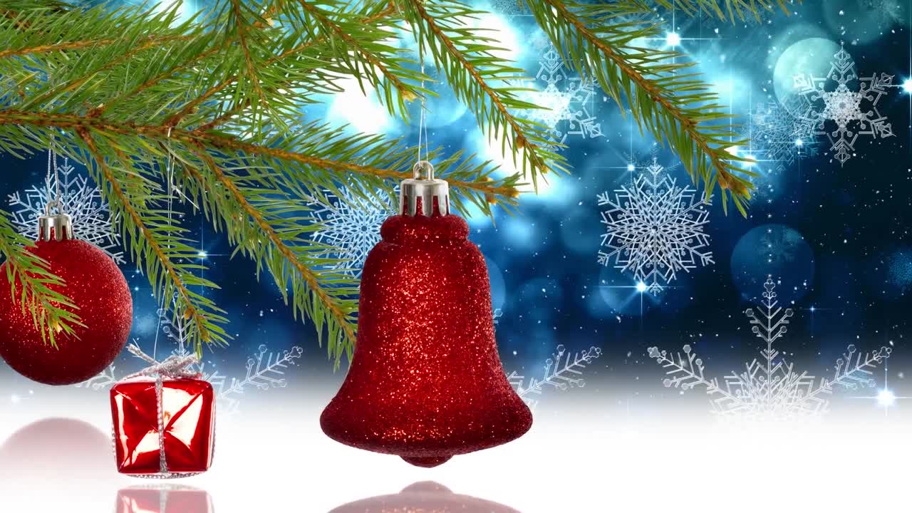 animación de la nieve cayendo sobre las bolas de navidad