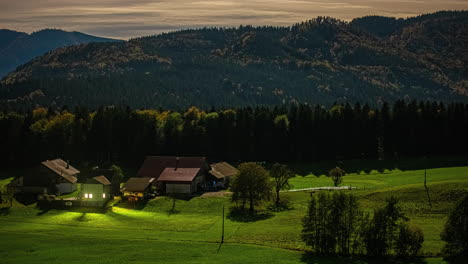 Timelapse-static-view-looking-over-tree-covered-hills-in-the-evening