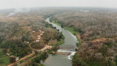 traveling up over a river, dam on a river in angola, africa 1