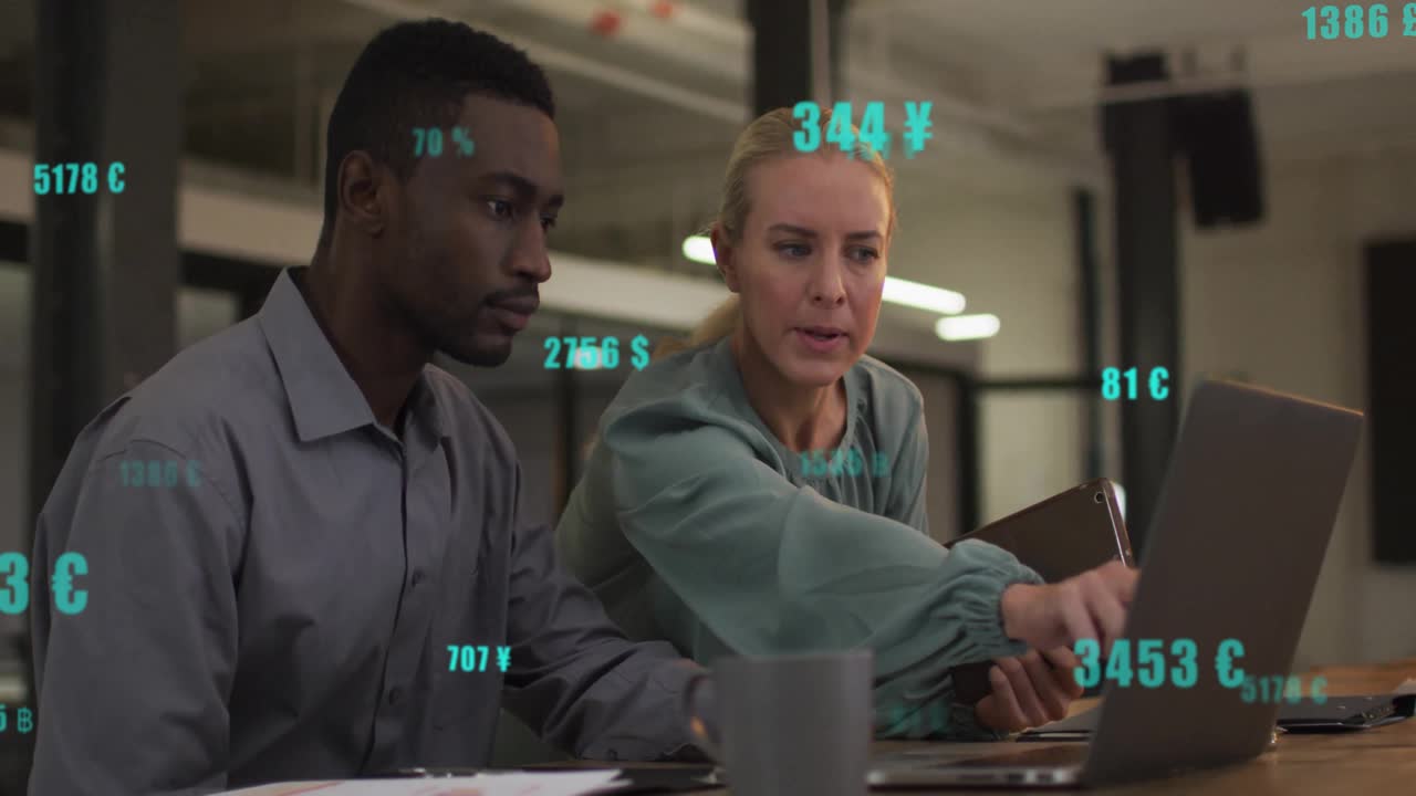 Animation of data with currency symbols over diverse colleagues discussing work in office
