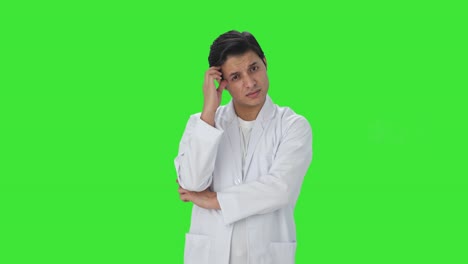 Confused-Indian-scientist-thinking-something-Green-screen