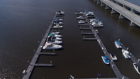 aerial drone shot flying over marina on ashley river in charleston, sc