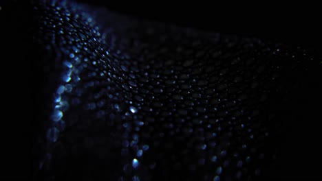 glowing pattern of snakeskin in macro close up motion view