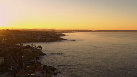 Silhouetted-La-Jolla-Coastline-during-colorful-sunrise