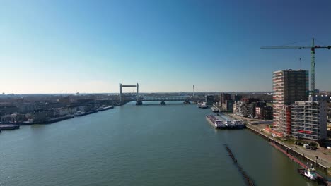 aerial shot of the city of dordrecht with the river maas and it's buildings