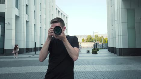 photographer taking picture in a city