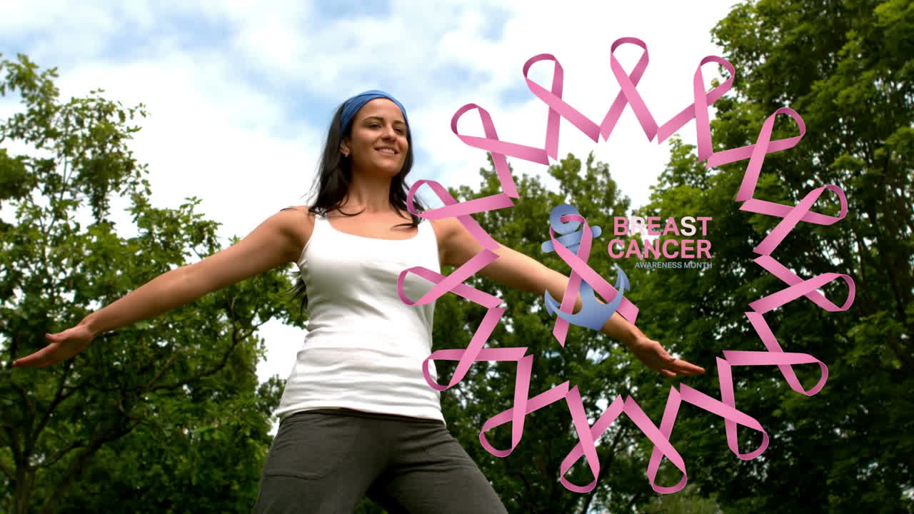Animación de texto del mes de concienciación sobre el cáncer sobre mujer birracial practicando yoga