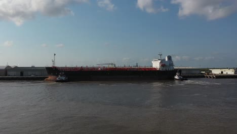 Merchant-ship-docked-at-Sabine-Neches-Canal-in-Port-Arthur-Texas