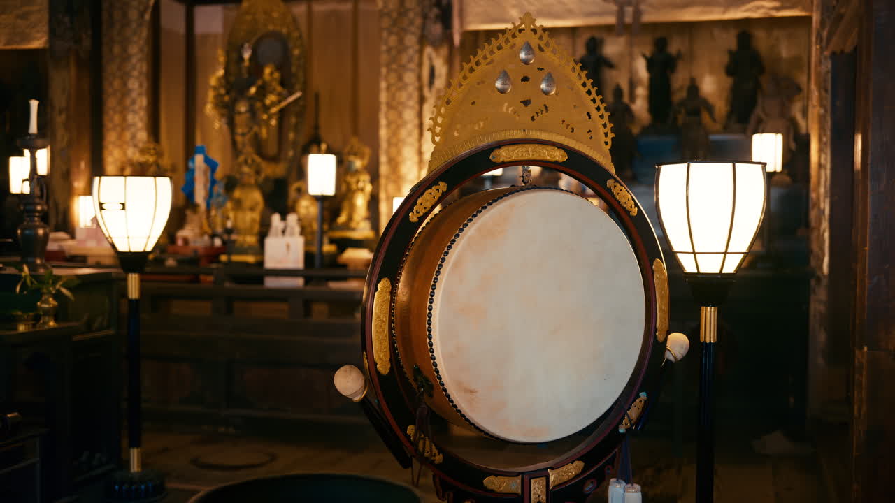 The inside of the of the Otagi Nenbutsuji Temple in Kyoto, Japan with yellow lights