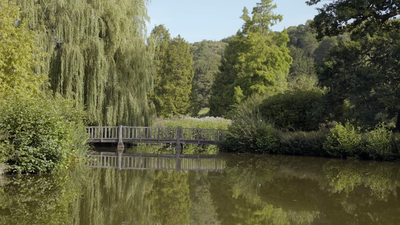 Static shot of bridge over pond at Chartwell, the country house near Kent, England where Winston Churchill lived