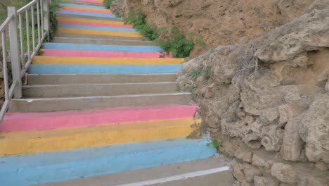 walking colourful stairs up the hill