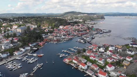 Overhead-view-of-Kragero-coastal-village-in-Telemark,-Norway---drone-dolly-in
