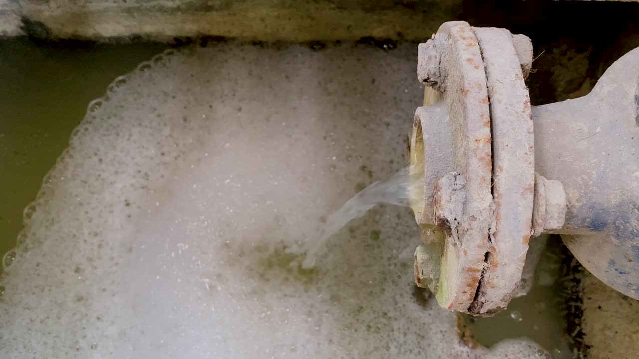 Dirty waste water coming out from pipe